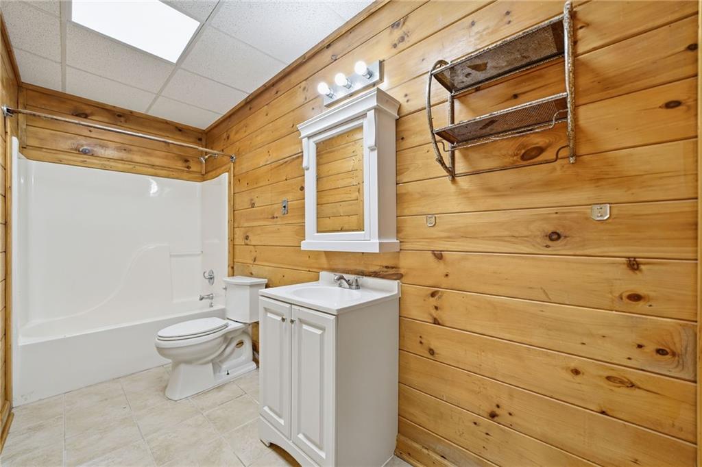 1384 Crystal Lane Northeast Ranger, GA 30734 - Photo 33 of 57 a bathroom with a sink toilet and shower