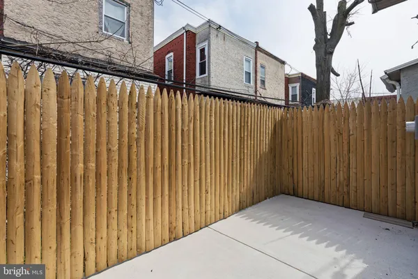 a view of a wooden fence