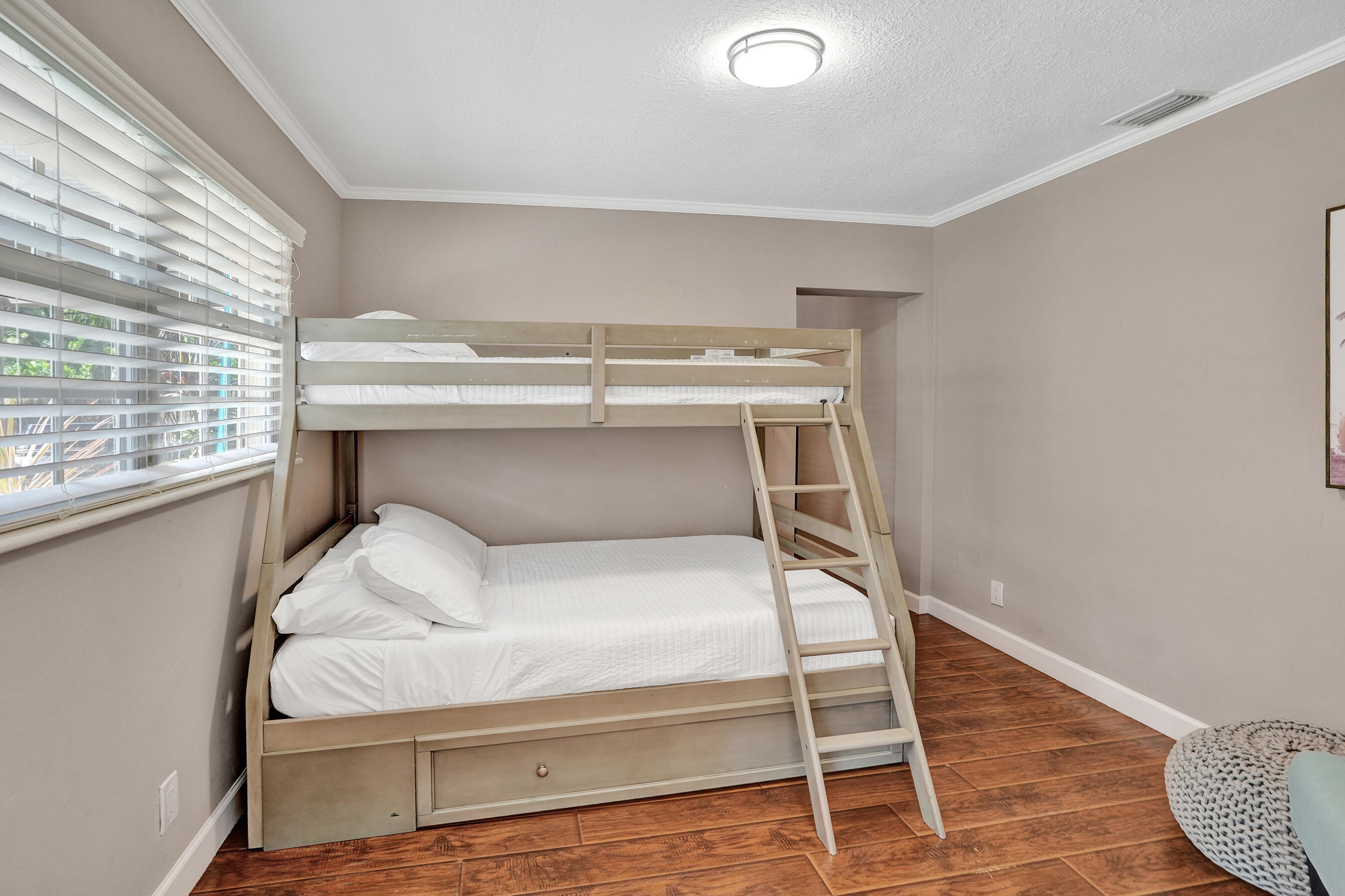 1440 Southeast 4th Court Deerfield Beach, FL 33441 - Photo 19 of 25 a bedroom with a bunk bed