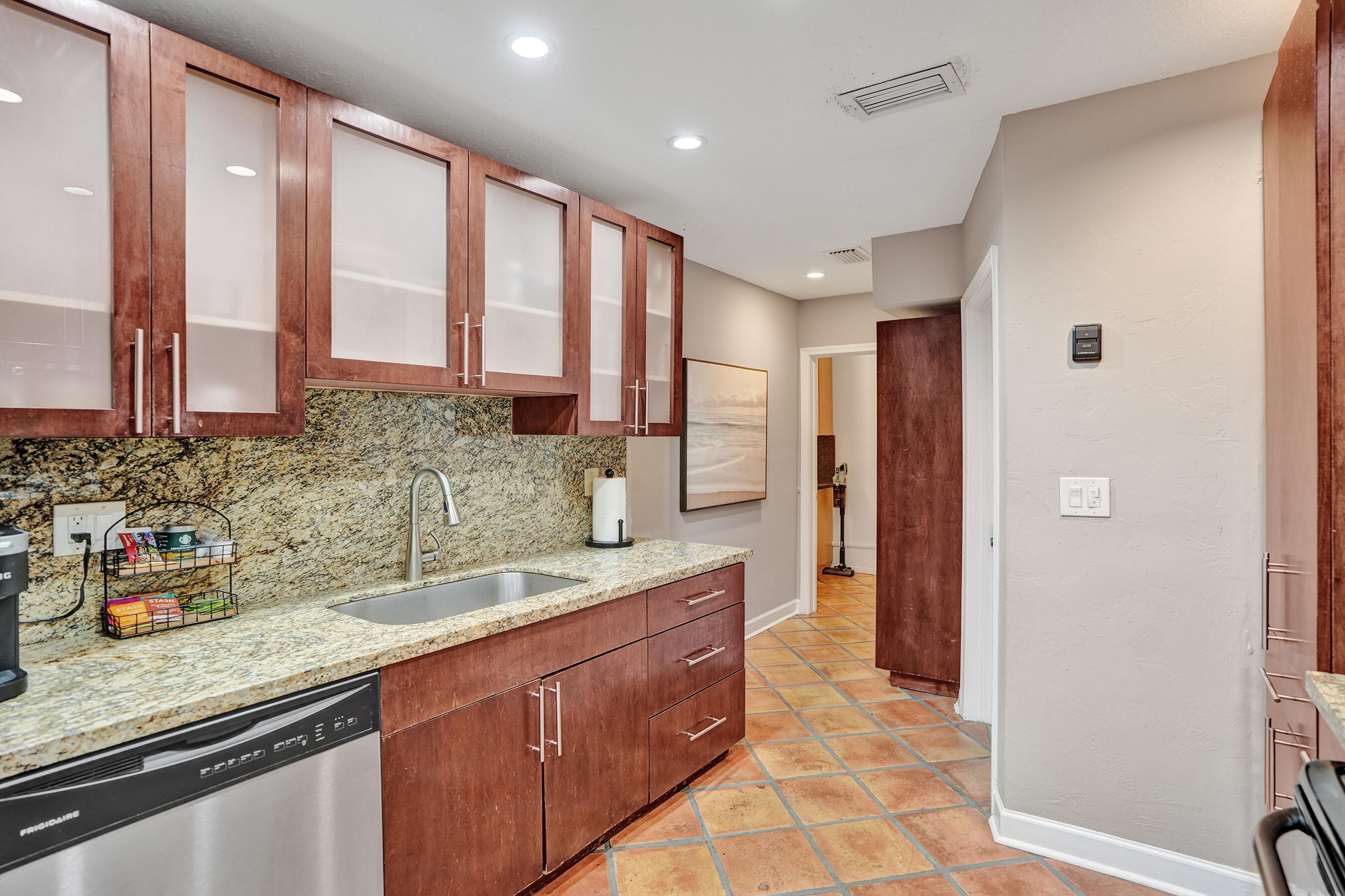 1440 Southeast 4th Court Deerfield Beach, FL 33441 - Photo 8 of 25 a spacious bathroom with a granite countertop sink mirror and double