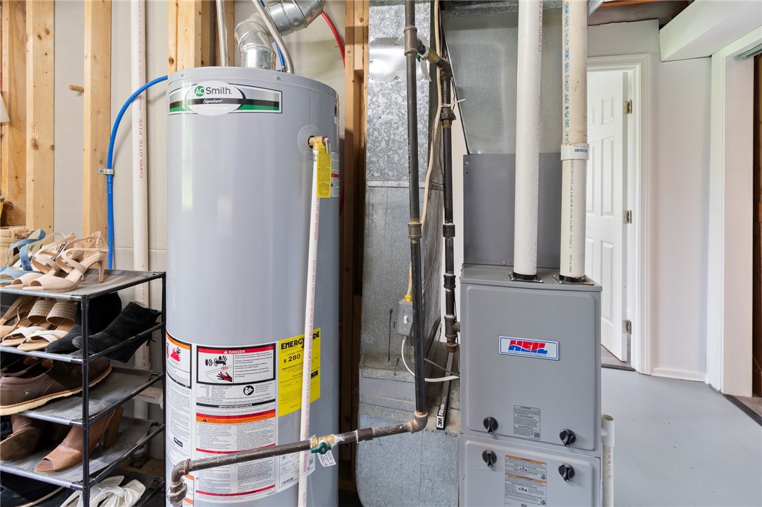 218 Kusak Road Henrietta, NY 14467 - Photo 23 of 33 High efficiency furnace and hot water heater.
