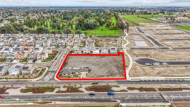 a wooden floor with a view of swimming pool