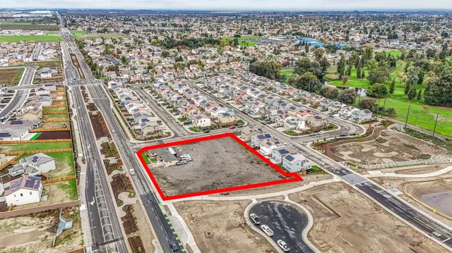 a view of swimming pool with a patio