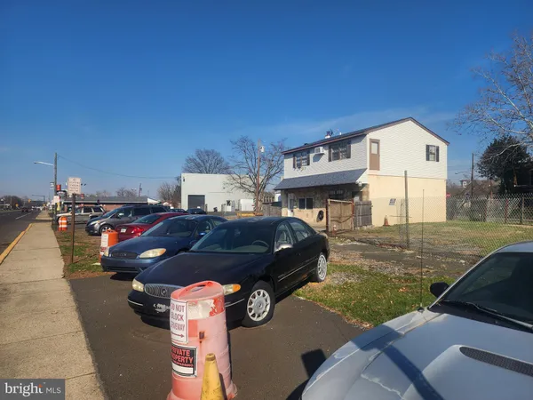 a view of a city street both side of a building