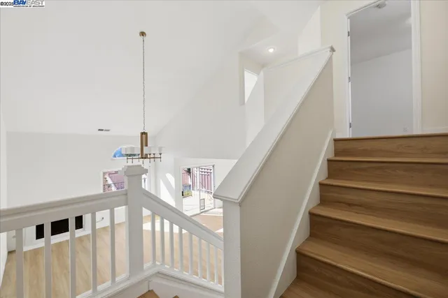 a bathroom with a sink a mirror and a toilet