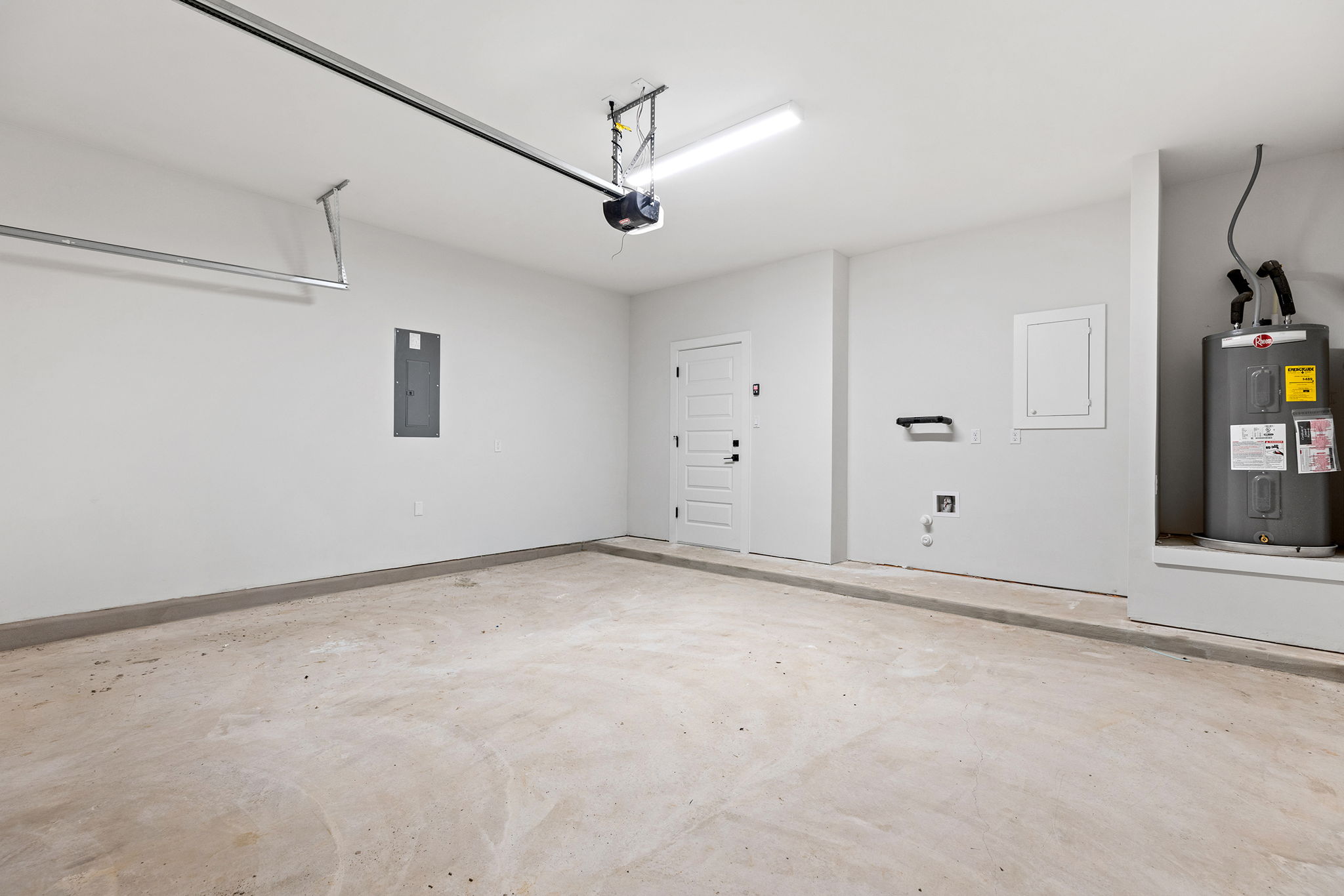 2600 Gattis School Road, Unit 1001 Round Rock, TX 78664 - Photo 30 of 40 A spacious and pristine garage, ready for vehicles and extra storage.