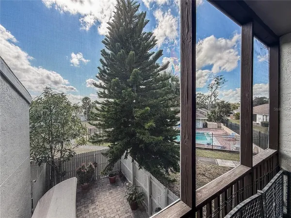 a spacious bedroom with a bed and a walk in closet