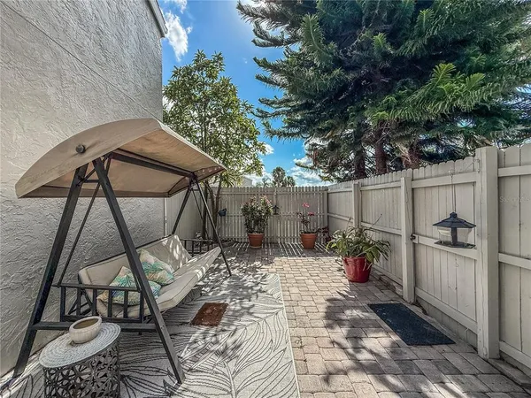 a view of a house with a tree