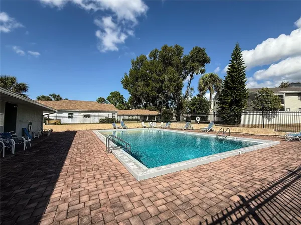 a view of a storage & utility room with a washer dryer