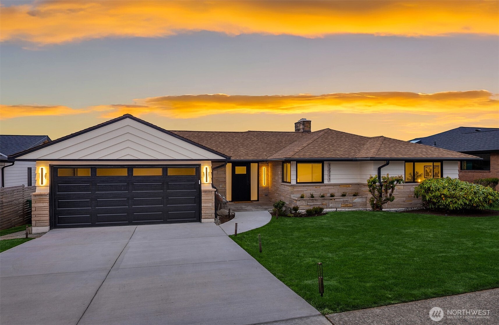 12711 9th Avenue Northwest Seattle, WA 98177 - Photo 2 of 40 a front view of a house with garden