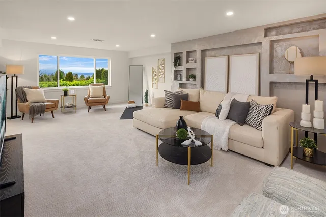 a living room with furniture and a large window