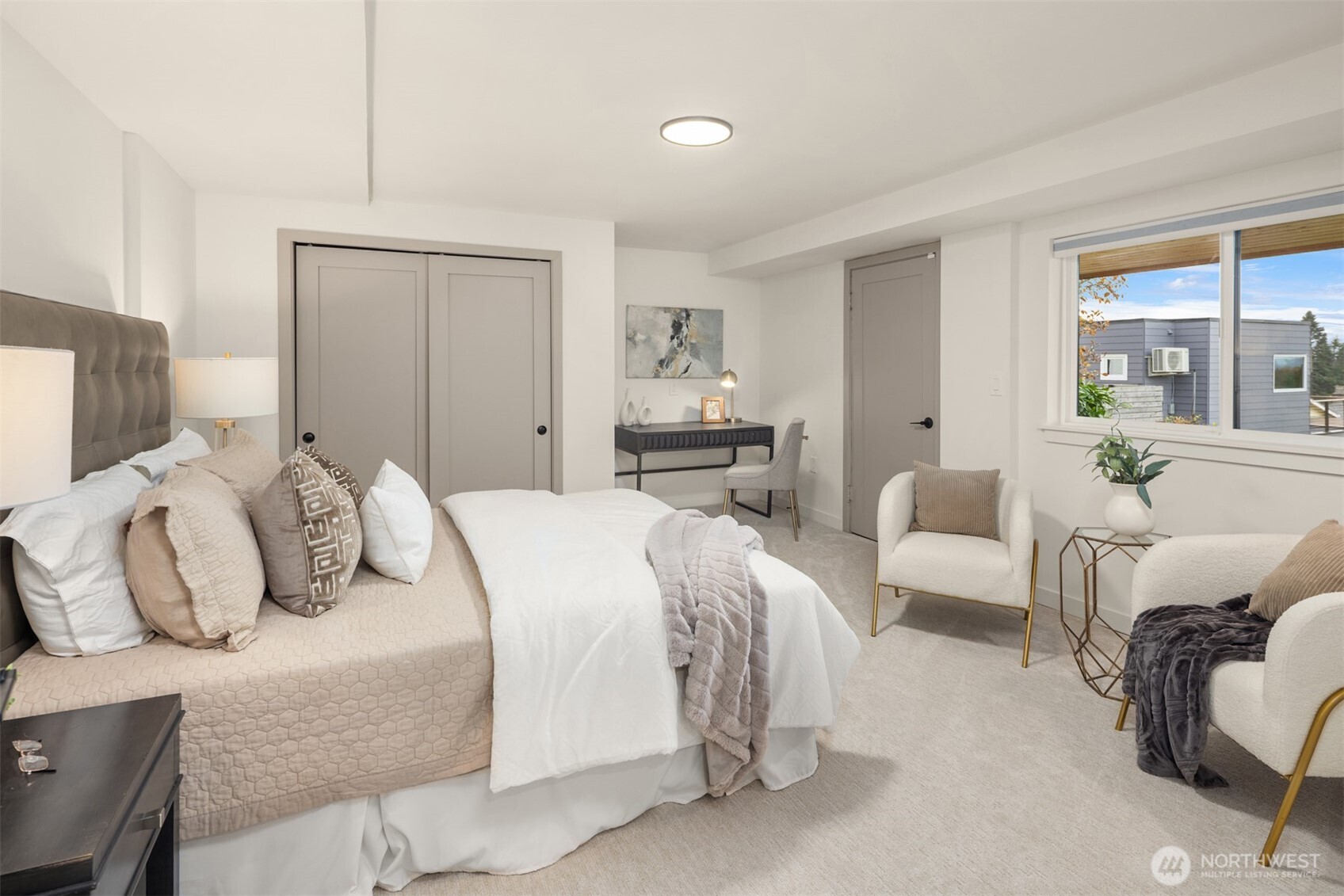 12711 9th Avenue Northwest Seattle, WA 98177 - Photo 30 of 40 a bedroom with a bed and a couch