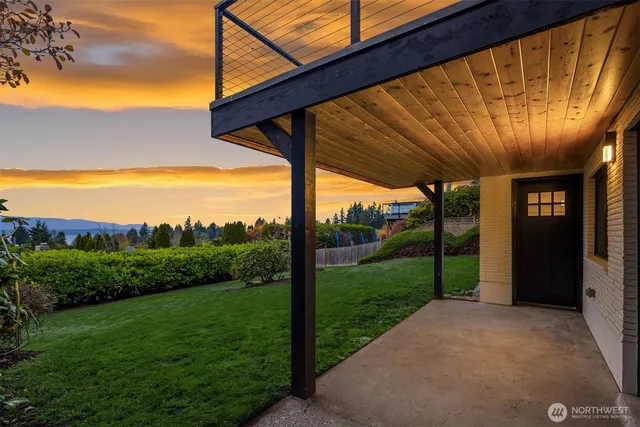 a view of a porch with a backyard