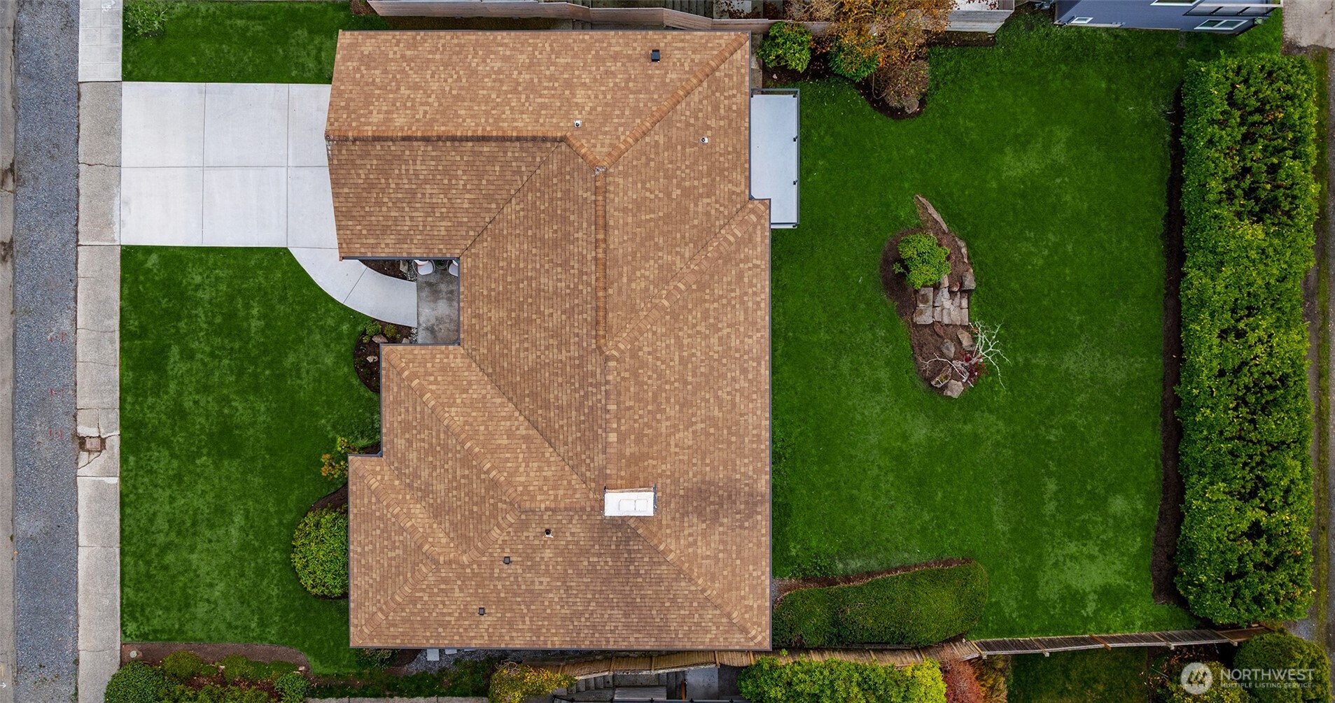 12711 9th Avenue Northwest Seattle, WA 98177 - Photo 37 of 40 an aerial view of a house with a yard