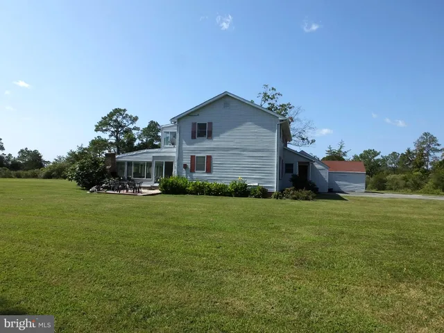 a view of a house with a big yard