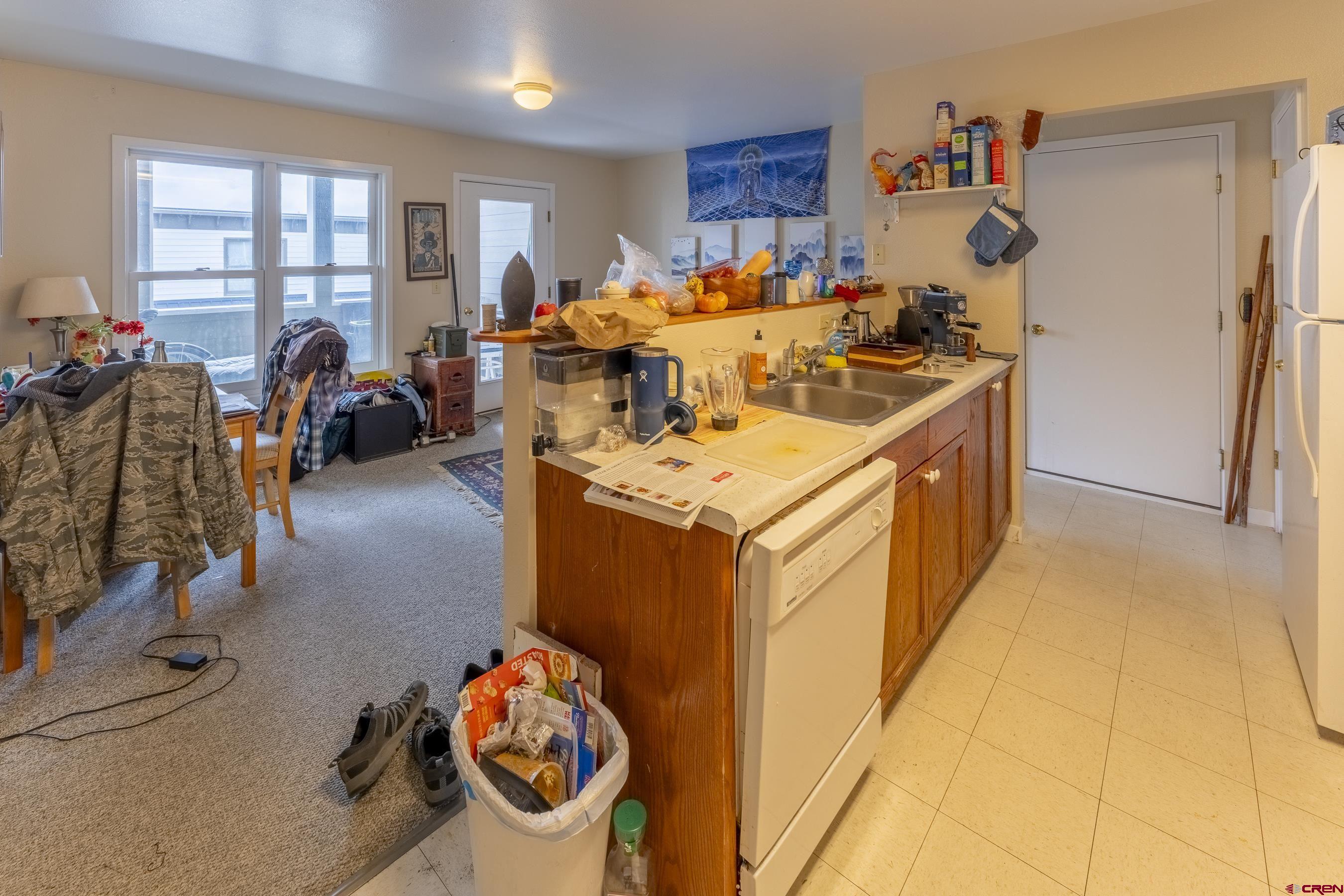 309 Belleview Avenue, Unit 2C Crested Butte, CO 81224 - Photo 13 of 17 a very nice looking room with many windows