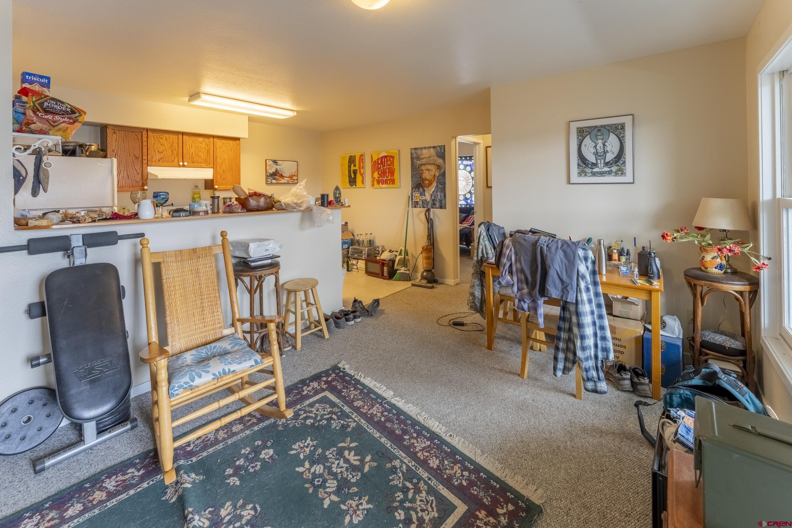 309 Belleview Avenue, Unit 2C Crested Butte, CO 81224 - Photo 10 of 17 a view of a living room and dining room