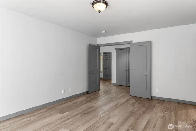 a view of a livingroom with wooden floor