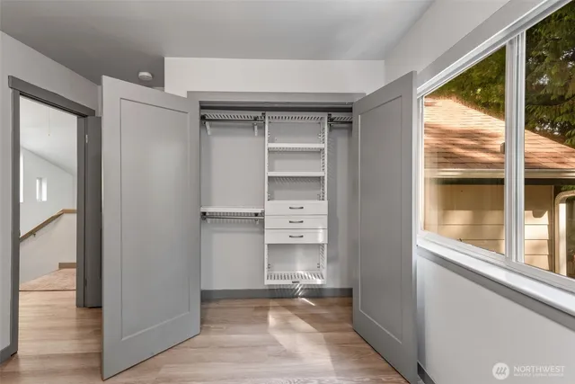 a view of walk in closet with window