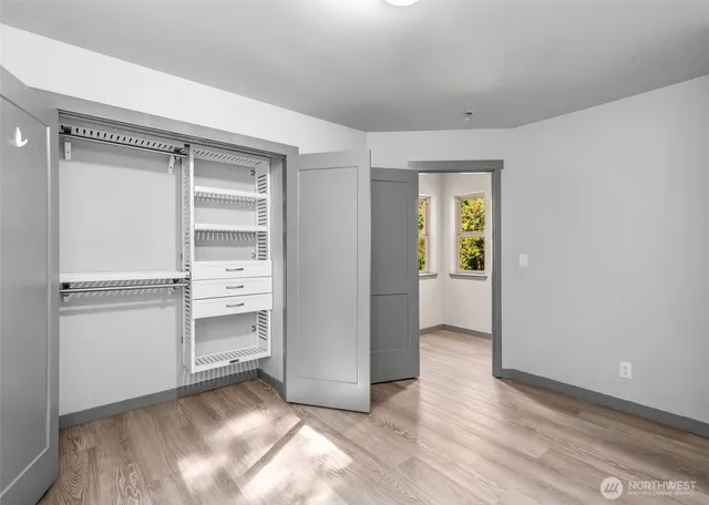 wooden floor and closet in a room