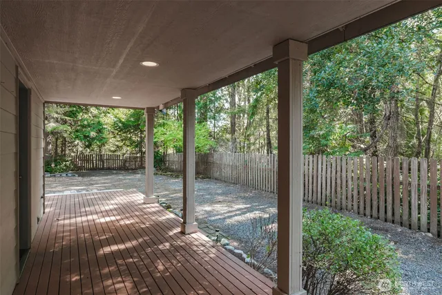 a view of a glass door and the yard