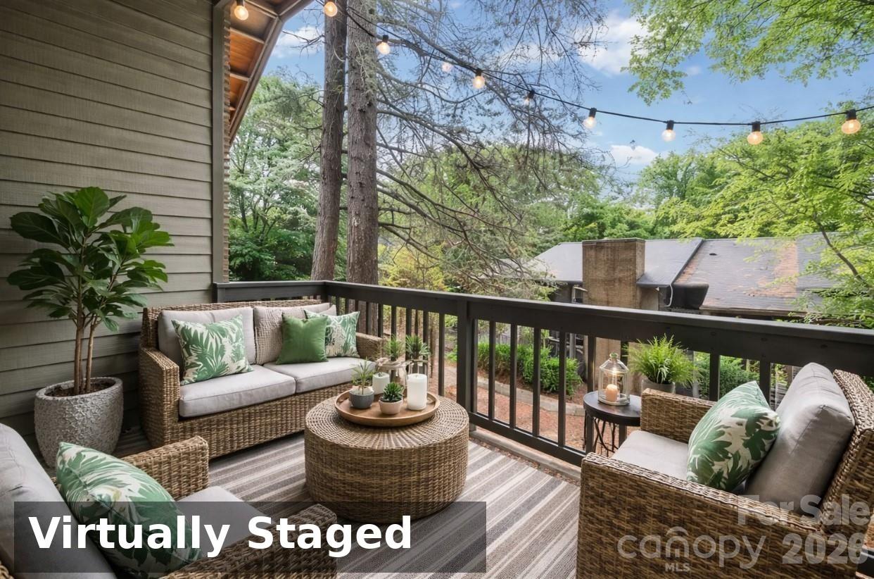 5026 Sardis Road Charlotte, NC 28270 - Photo 6 of 21 a outdoor living room with furniture and a potted plant