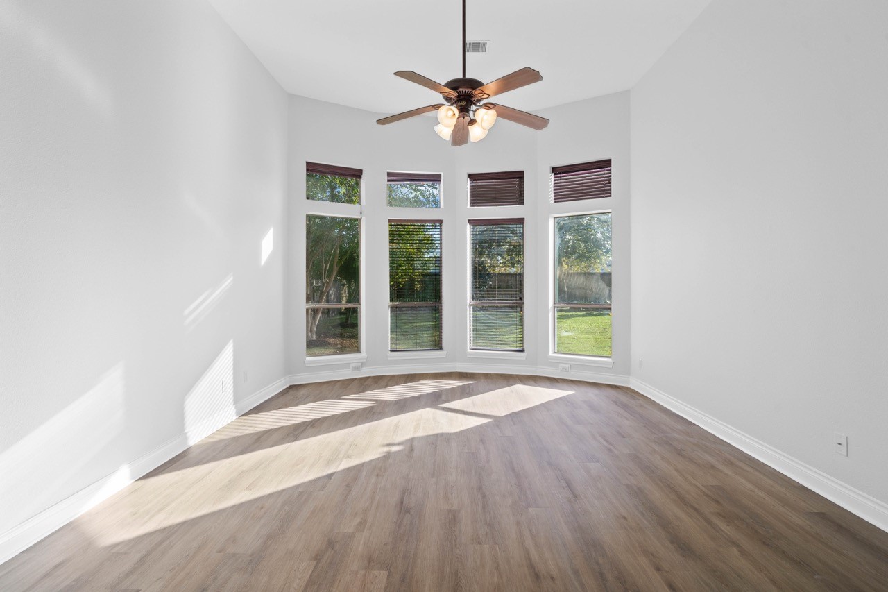 26411 Ridgefield Park Lane Cypress, TX 77433 - Photo 25 of 50 a view of an empty room with a window