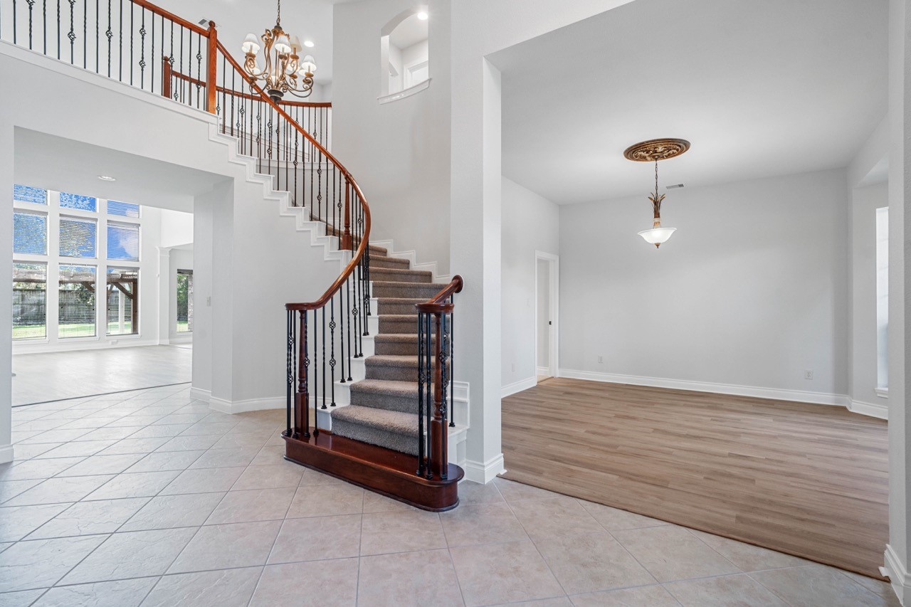 26411 Ridgefield Park Lane Cypress, TX 77433 - Photo 3 of 50 a view of entryway and hall with wooden floor