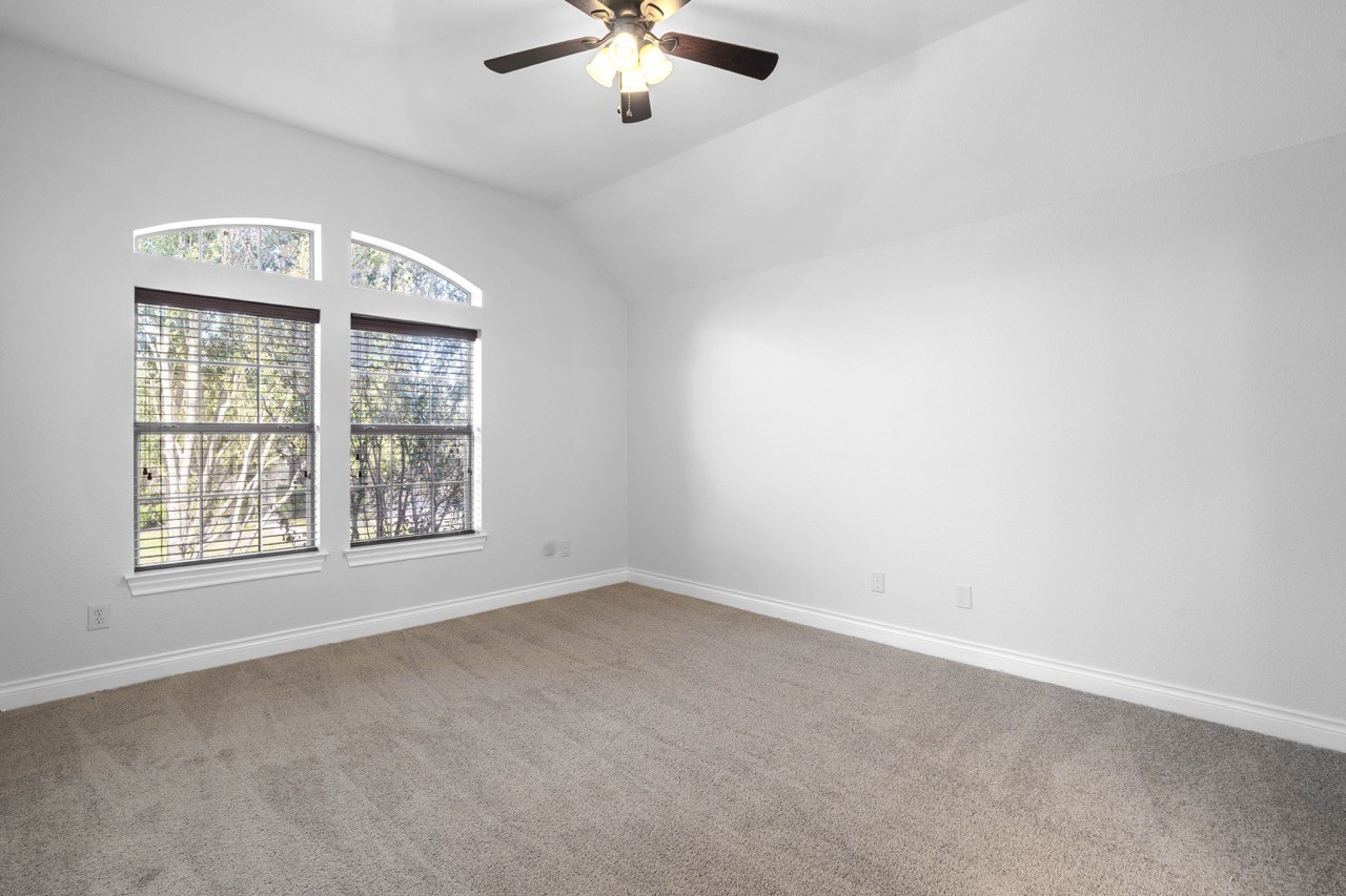 26411 Ridgefield Park Lane Cypress, TX 77433 - Photo 33 of 50 an empty room with a window