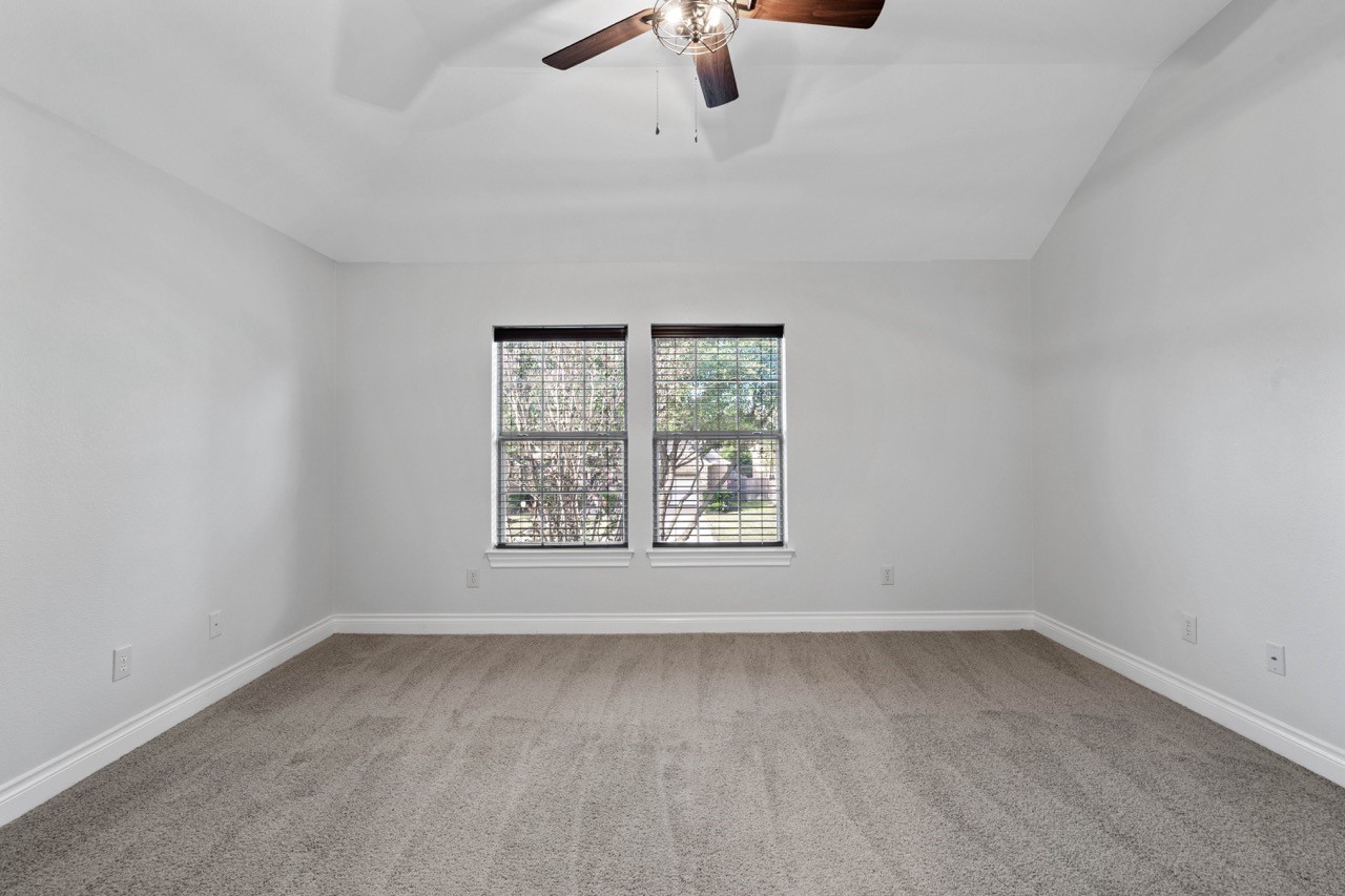 26411 Ridgefield Park Lane Cypress, TX 77433 - Photo 36 of 50 an empty room with a window