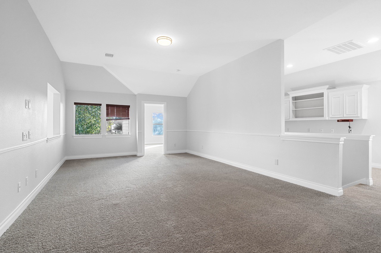 26411 Ridgefield Park Lane Cypress, TX 77433 - Photo 38 of 50 an empty room with windows and entrance