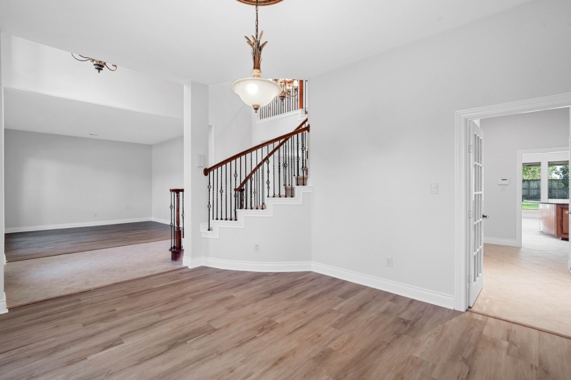 26411 Ridgefield Park Lane Cypress, TX 77433 - Photo 7 of 50 a view of empty room with wooden floor
