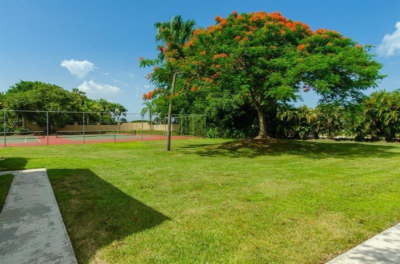 8116 Thames Boulevard, Unit A Boca Raton, FL 33433 - Photo 18 of 27 a view of a park with large trees