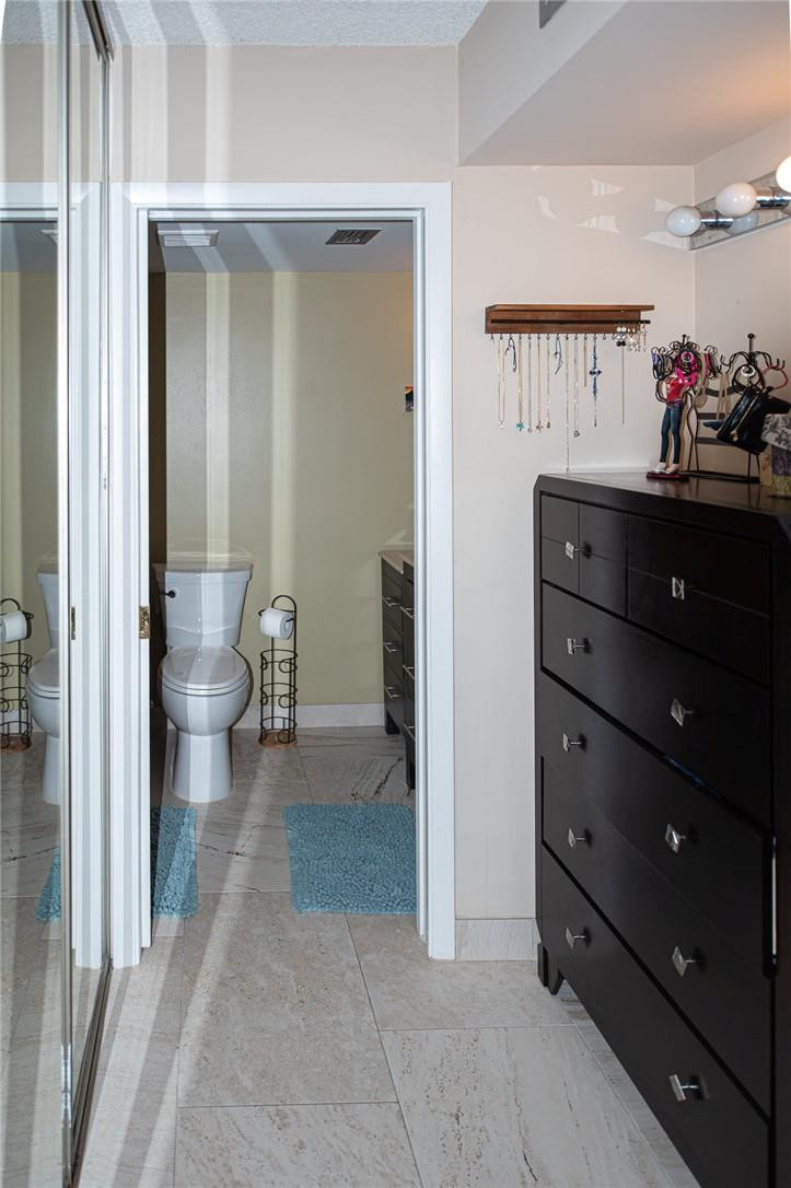 8116 Thames Boulevard, Unit A Boca Raton, FL 33433 - Photo 10 of 27 a view of a hallway and a livingroom with furniture