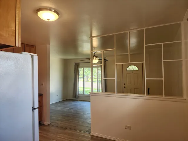 a view of balcony with wooden floor
