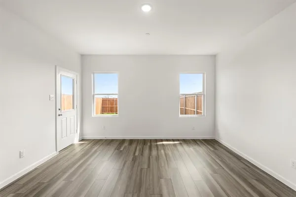 a view of kitchen with wooden floor