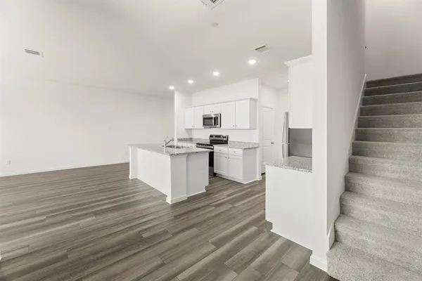 a bathroom with a sink toilet and a bathtub