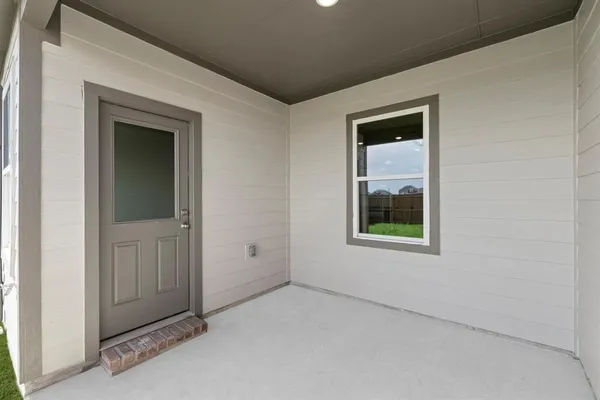 a backyard of a house with lots of green space
