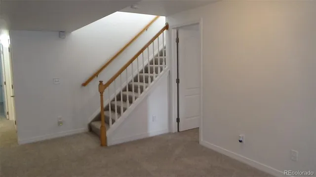 an empty room with a hallway