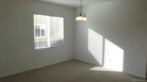 en empty room with windows