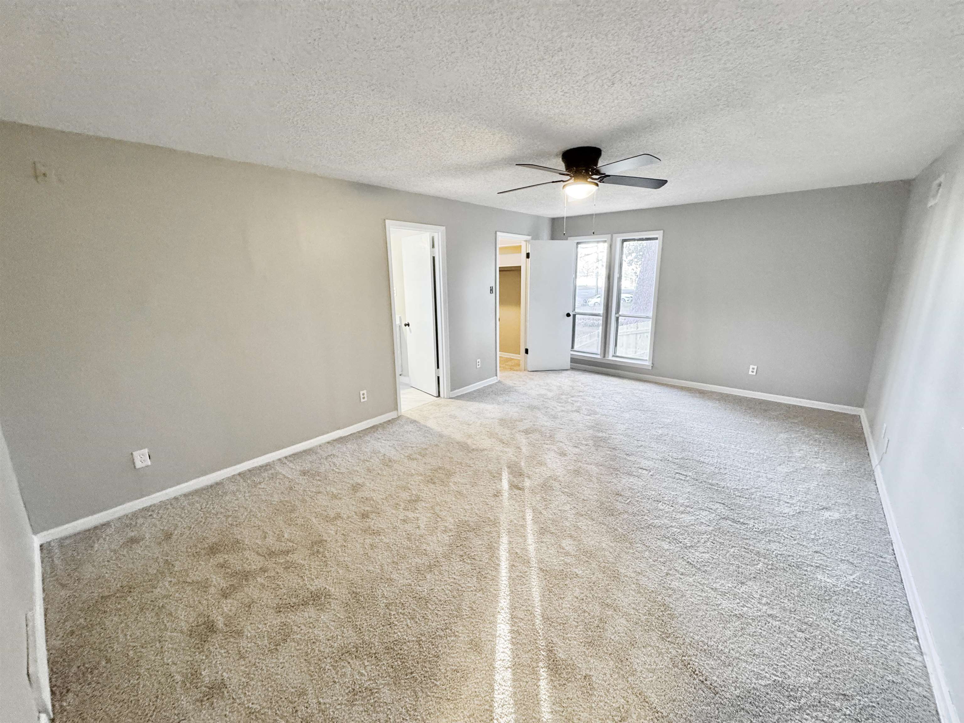 3836 Birchleaf Road Memphis, TN 38116 - Photo 27 of 40 Empty room with carpet floors, a textured ceiling, and ceiling fan