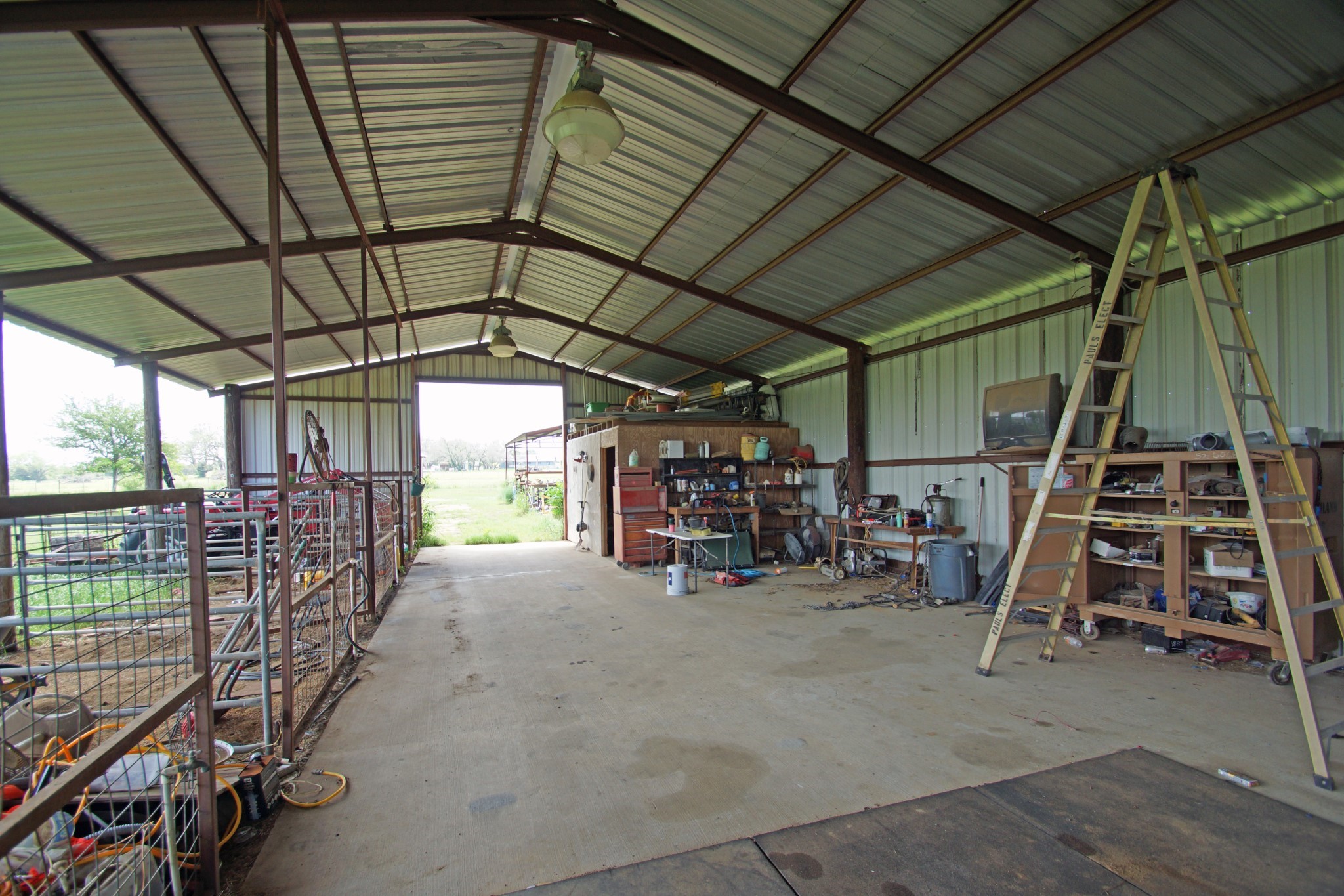 244 Apache Springs Road Briggs, TX 78608 - Photo 11 of 25 a view of storage and utility room