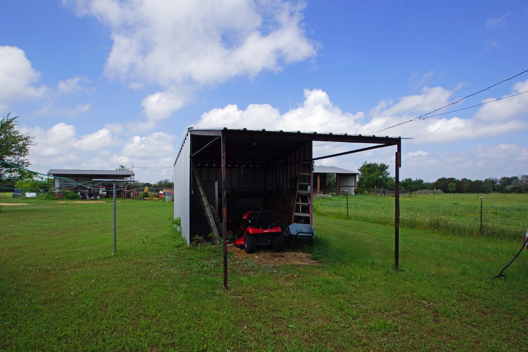 244 Apache Springs Road Briggs, TX 78608 - Photo 25 of 25 a view of a garden with a slide