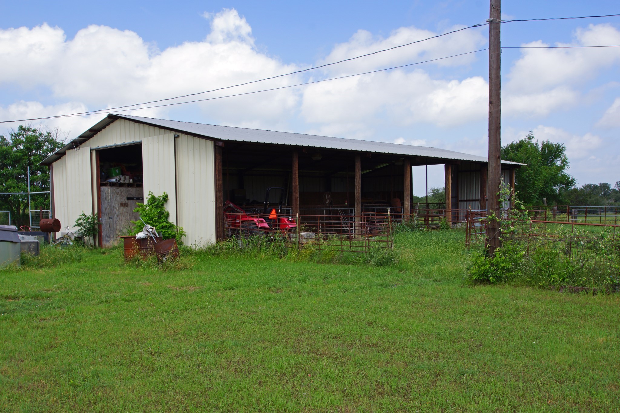 244 Apache Springs Road Briggs, TX 78608 - Photo 9 of 25 a view of a porch with a yard