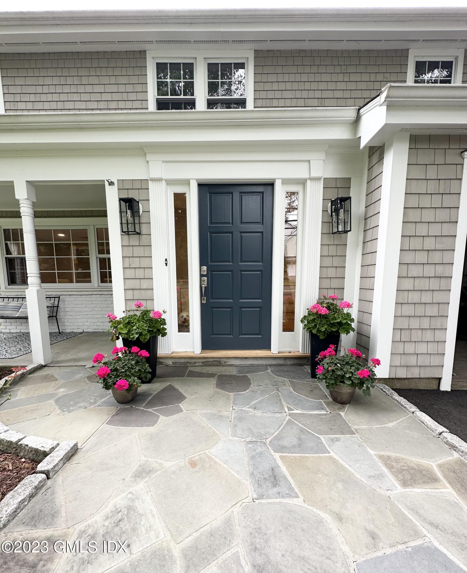 28 Old Orchard Road Riverside, CT 06878 - Photo 2 of 11 a front view of a house