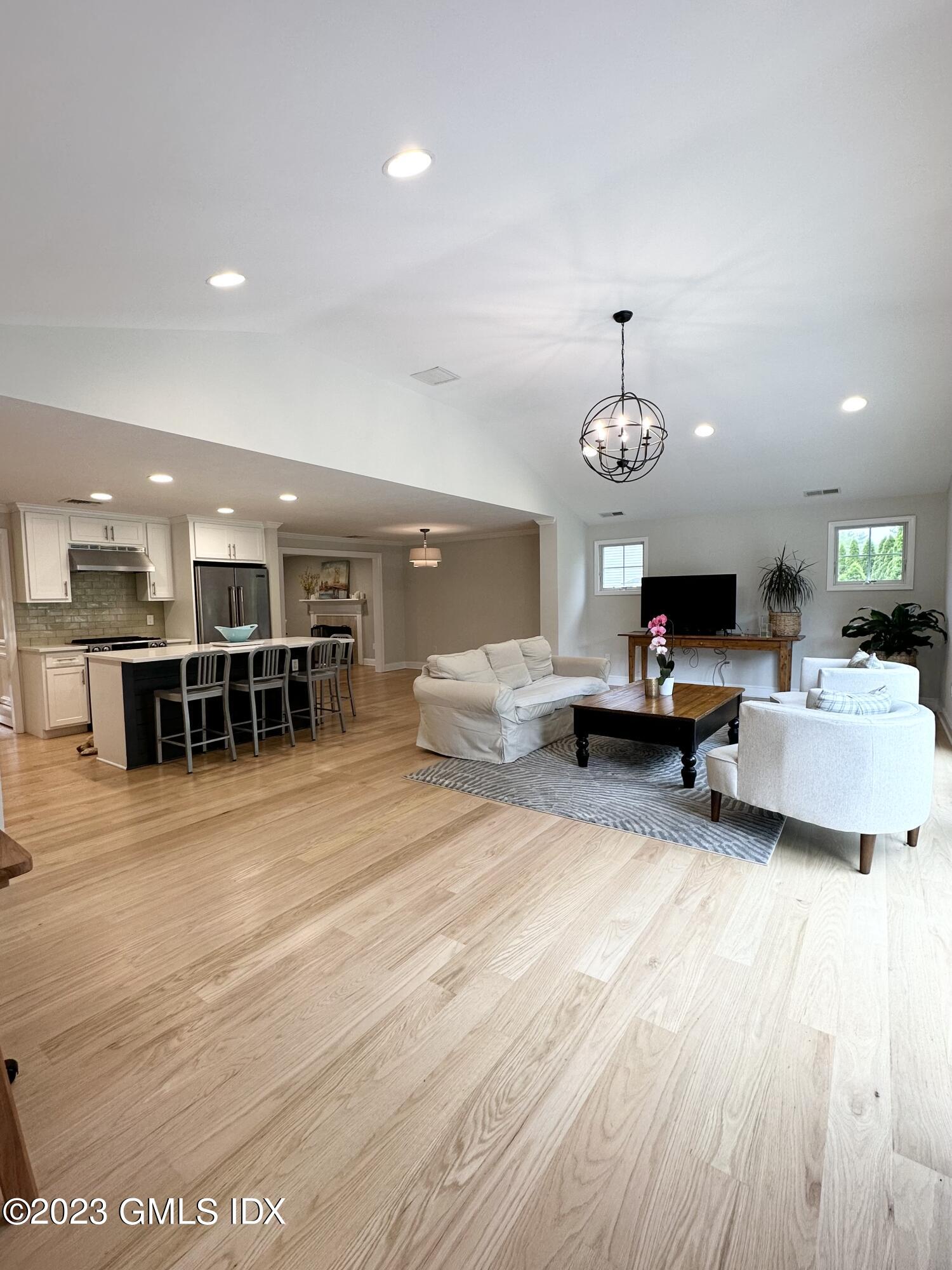 28 Old Orchard Road Riverside, CT 06878 - Photo 5 of 11 a living room with furniture and a large window