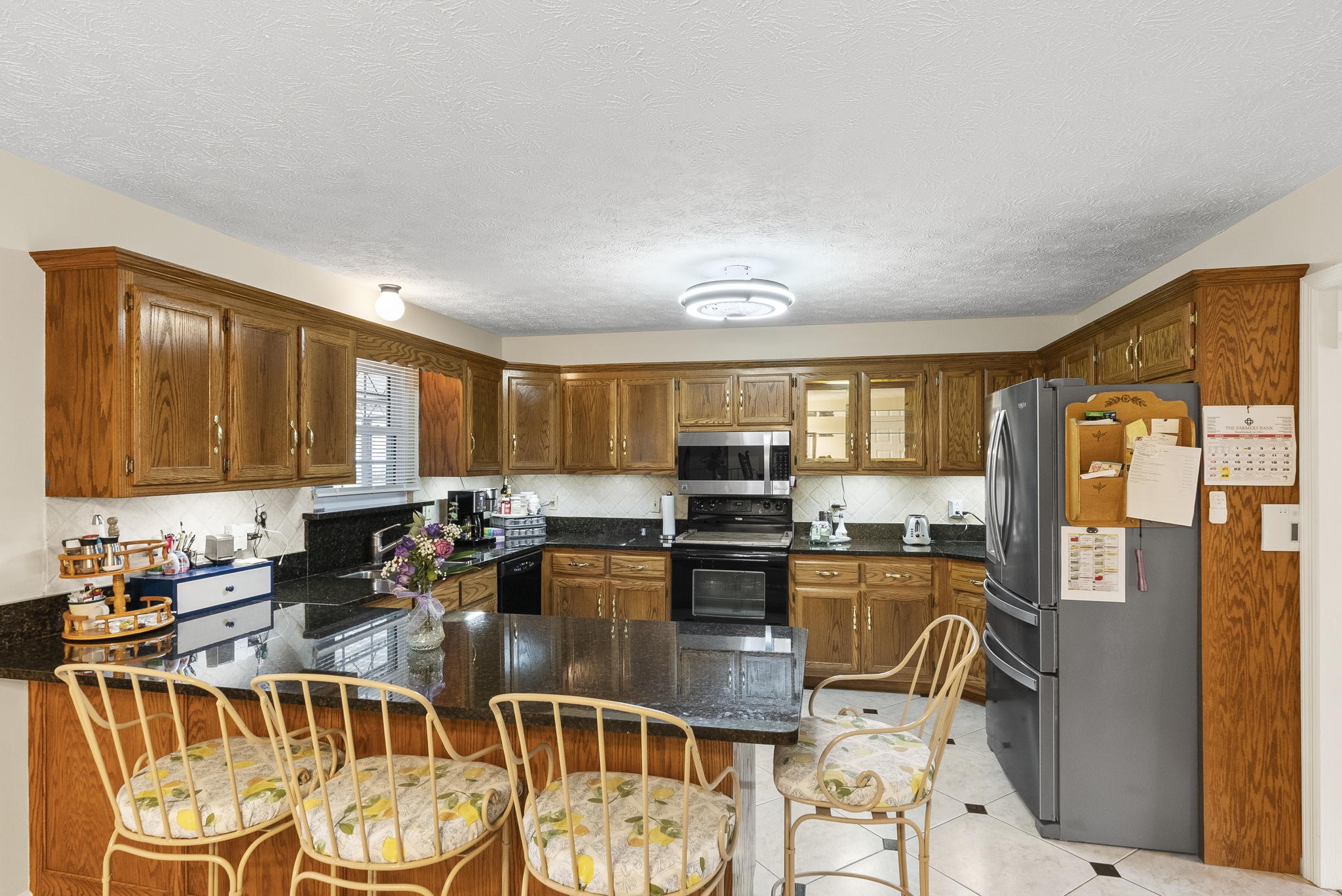 8320 Cedar Grove Road Cross Plains, TN 37049 - Photo 5 of 15 a kitchen with lots of counter top space and windows