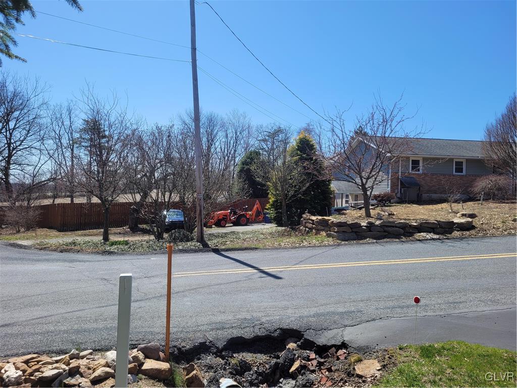 4563 Timberline Road Walnutport, PA 18088 - Photo 7 of 36 Lower driveway with a garage and entrance to the l