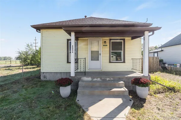 a view of a porch with furniture