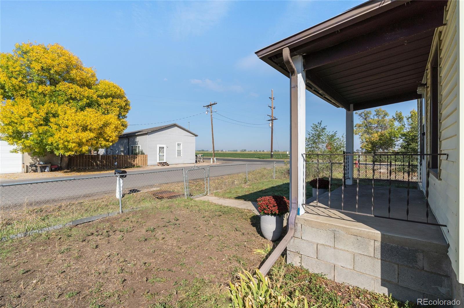 1984 Caroline Avenue Fort Lupton, CO 80621 - Photo 8 of 33 a house view with a outdoor space